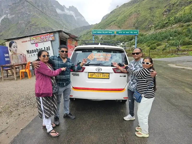 Family with Suri Tours Toyota Innova Crysta at Mana Village on the Badrinath route